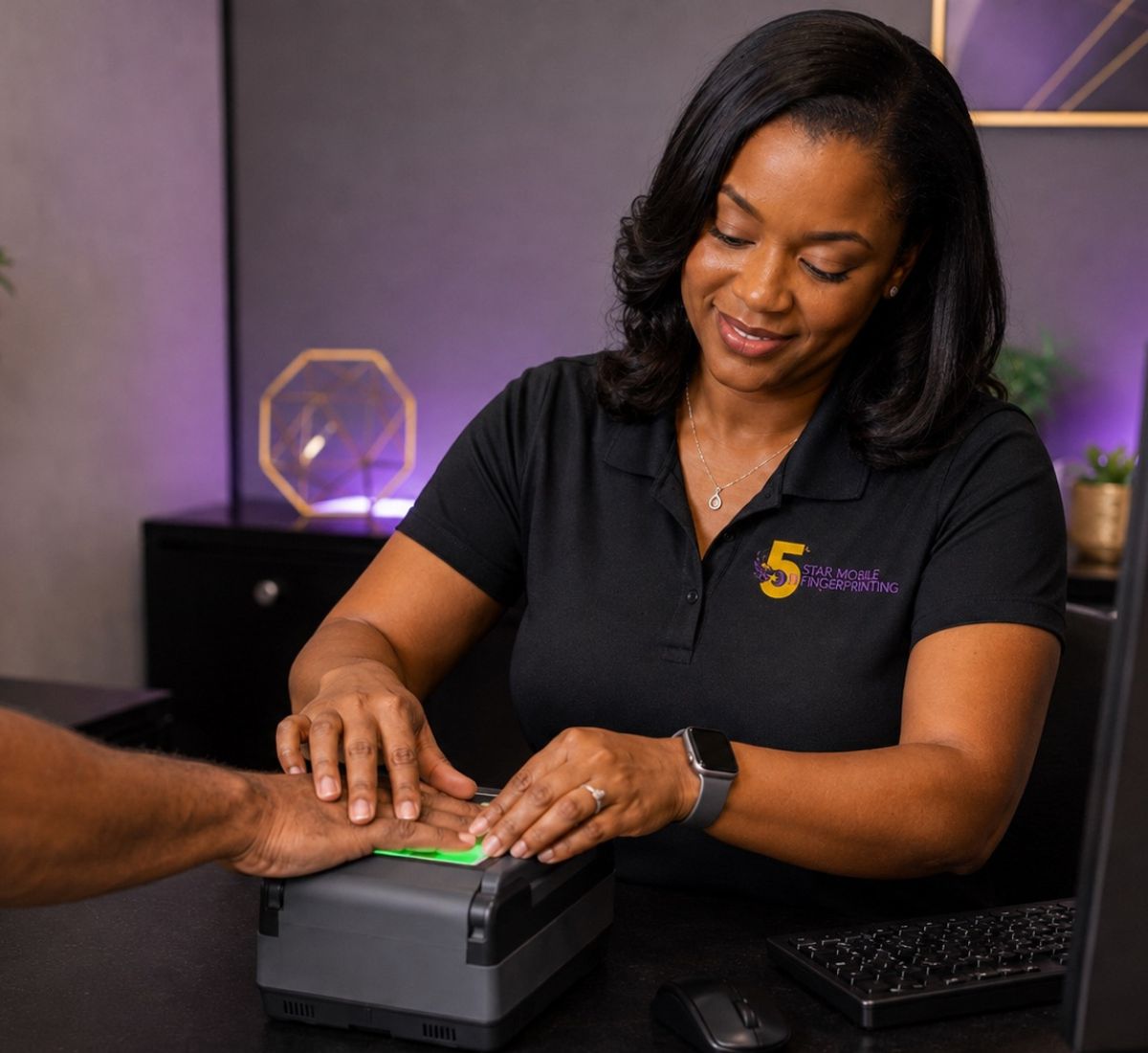 African American fingerprint technician providing LiveScan fingerprinting services in Orland